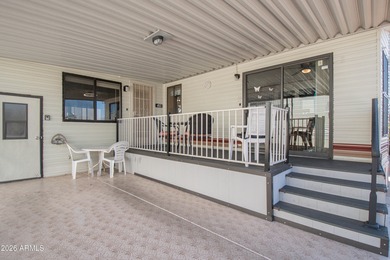 This cute home is located in Carriage Manor Resort, a premier on Fountain of the Sun Country Club in Arizona - for sale on GolfHomes.com, golf home, golf lot