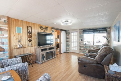 This cute home is located in Carriage Manor Resort, a premier on Fountain of the Sun Country Club in Arizona - for sale on GolfHomes.com, golf home, golf lot