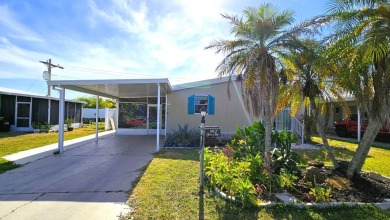 Welcome to your perfect retirement oasis in the charming city of on Herons Glen Golf and Country Club in Florida - for sale on GolfHomes.com, golf home, golf lot
