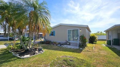 Welcome to your perfect retirement oasis in the charming city of on Herons Glen Golf and Country Club in Florida - for sale on GolfHomes.com, golf home, golf lot