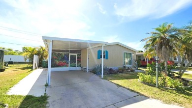 Welcome to your perfect retirement oasis in the charming city of on Herons Glen Golf and Country Club in Florida - for sale on GolfHomes.com, golf home, golf lot