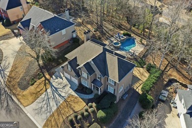 Don't miss the opportunity to own this gem in Towne Lake Hills on Towne Lake Hills Golf Club in Georgia - for sale on GolfHomes.com, golf home, golf lot