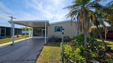 Welcome to your perfect retirement oasis in the charming city of on Herons Glen Golf and Country Club in Florida - for sale on GolfHomes.com, golf home, golf lot