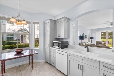 1ST-FLOOR END UNIT - LAKE & GOLF COURSE VIEWS - BEAUTIFULLY on The Club At Strand in Florida - for sale on GolfHomes.com, golf home, golf lot