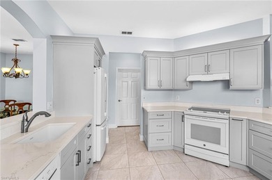 1ST-FLOOR END UNIT - LAKE & GOLF COURSE VIEWS - BEAUTIFULLY on The Club At Strand in Florida - for sale on GolfHomes.com, golf home, golf lot