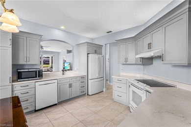 1ST-FLOOR END UNIT - LAKE & GOLF COURSE VIEWS - BEAUTIFULLY on The Club At Strand in Florida - for sale on GolfHomes.com, golf home, golf lot