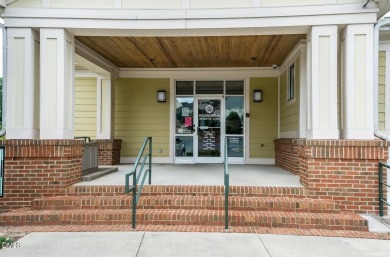 Charming Townhome with Golf Course Views! Enjoy serene views of on Hedingham Golf and Athletic Club in North Carolina - for sale on GolfHomes.com, golf home, golf lot