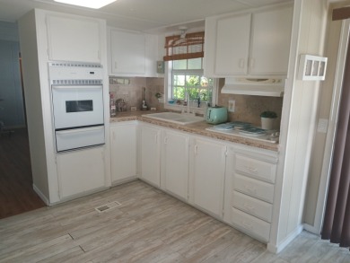 -- CHARMING 2 Bedroom / 1 Bath BEACH COTTAGE!! Located in the on Spessard Holland Golf Course in Florida - for sale on GolfHomes.com, golf home, golf lot