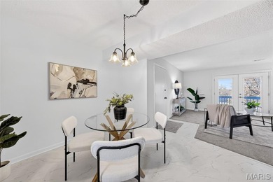 Live like you're on vacation every day in this completely on Lake Saint Louis Par 3 in Missouri - for sale on GolfHomes.com, golf home, golf lot