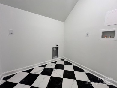 Welcome Home! This beautifully renovated property sits on a rare on  in North Carolina - for sale on GolfHomes.com, golf home, golf lot