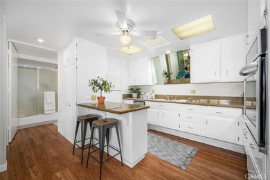 Set within an open, expansive park-like setting, 52i in Mutual 4 on Leisure World Seal Beach Golf Course in California - for sale on GolfHomes.com, golf home, golf lot