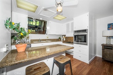 Set within an open, expansive park-like setting, 52i in Mutual 4 on Leisure World Seal Beach Golf Course in California - for sale on GolfHomes.com, golf home, golf lot