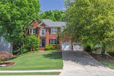 Perfectly positioned on the fairway of the par-5 2nd hole in the on Towne Lake Hills Golf Club in Georgia - for sale on GolfHomes.com, golf home, golf lot