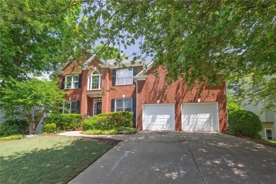 Perfectly positioned on the fairway of the par-5 2nd hole in the on Towne Lake Hills Golf Club in Georgia - for sale on GolfHomes.com, golf home, golf lot