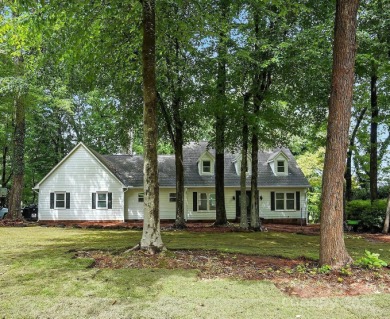 Welcome Home! This beautifully renovated property sits on a rare on  in North Carolina - for sale on GolfHomes.com, golf home, golf lot
