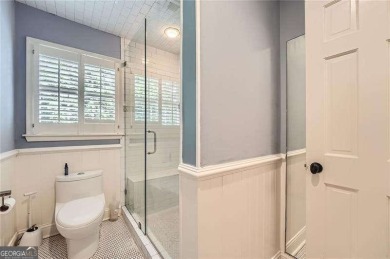 Set on a beautifully manicured 3/4-acre lot in East Cobb's on Atlanta Country Club in Georgia - for sale on GolfHomes.com, golf home, golf lot