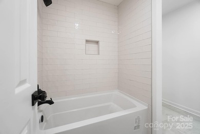 Welcome to this exceptional, renovated home positioned on a rare on Gaston Country Club in North Carolina - for sale on GolfHomes.com, golf home, golf lot