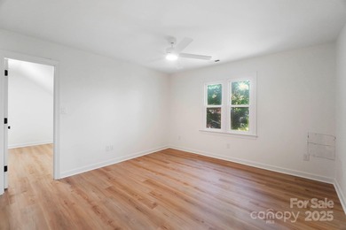 Welcome to this exceptional, renovated home positioned on a rare on Gaston Country Club in North Carolina - for sale on GolfHomes.com, golf home, golf lot