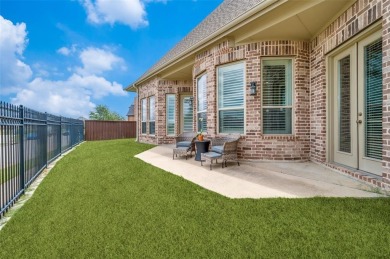 Stunning Corner Lot Home with Unmatched Pond Views in Premier on The Tribute At the Colony in Texas - for sale on GolfHomes.com, golf home, golf lot