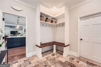 Set on a beautifully manicured 3/4-acre lot in East Cobb's on Atlanta Country Club in Georgia - for sale on GolfHomes.com, golf home, golf lot