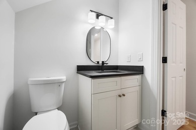 Welcome to this exceptional, renovated home positioned on a rare on Gaston Country Club in North Carolina - for sale on GolfHomes.com, golf home, golf lot