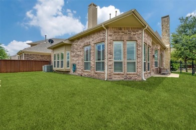 Stunning Corner Lot Home with Unmatched Pond Views in Premier on The Tribute At the Colony in Texas - for sale on GolfHomes.com, golf home, golf lot