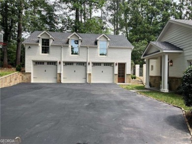 Set on a beautifully manicured 3/4-acre lot in East Cobb's on Atlanta Country Club in Georgia - for sale on GolfHomes.com, golf home, golf lot