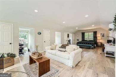 Set on a beautifully manicured 3/4-acre lot in East Cobb's on Atlanta Country Club in Georgia - for sale on GolfHomes.com, golf home, golf lot