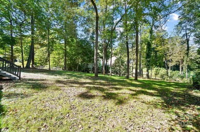 Welcome to this exceptional, renovated home positioned on a rare on Gaston Country Club in North Carolina - for sale on GolfHomes.com, golf home, golf lot