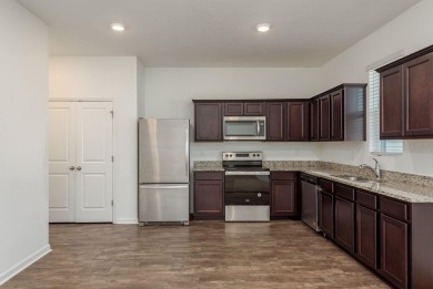 Built in 2021, this 3 bedroom, 2.5 bathroom home in the highly on The Links of Lake Bernadette in Florida - for sale on GolfHomes.com, golf home, golf lot