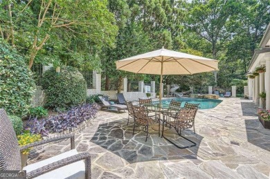 Set on a beautifully manicured 3/4-acre lot in East Cobb's on Atlanta Country Club in Georgia - for sale on GolfHomes.com, golf home, golf lot
