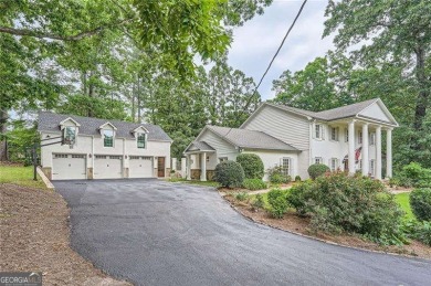 Set on a beautifully manicured 3/4-acre lot in East Cobb's on Atlanta Country Club in Georgia - for sale on GolfHomes.com, golf home, golf lot