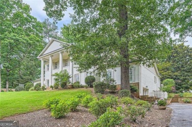 Set on a beautifully manicured 3/4-acre lot in East Cobb's on Atlanta Country Club in Georgia - for sale on GolfHomes.com, golf home, golf lot