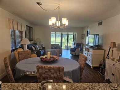 Beautifully updated 1st floor end unit with fantastic lake and on Countryside Golf and Country Club in Florida - for sale on GolfHomes.com, golf home, golf lot