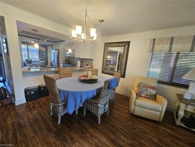 Beautifully updated 1st floor end unit with fantastic lake and on Countryside Golf and Country Club in Florida - for sale on GolfHomes.com, golf home, golf lot