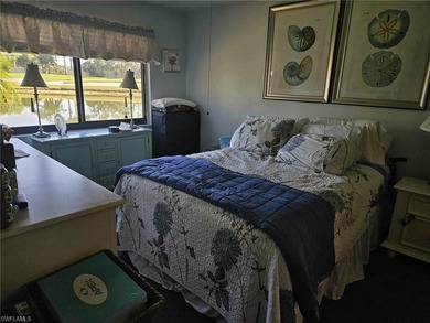 Beautifully updated 1st floor end unit with fantastic lake and on Countryside Golf and Country Club in Florida - for sale on GolfHomes.com, golf home, golf lot