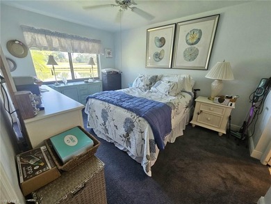 Beautifully updated 1st floor end unit with fantastic lake and on Countryside Golf and Country Club in Florida - for sale on GolfHomes.com, golf home, golf lot