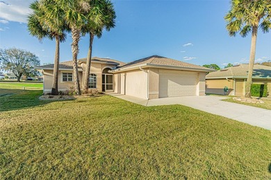 COME to SUNNY FLORIDA! Welcome to resort-style living in the on Tampa Bay Golf and Country Club in Florida - for sale on GolfHomes.com, golf home, golf lot