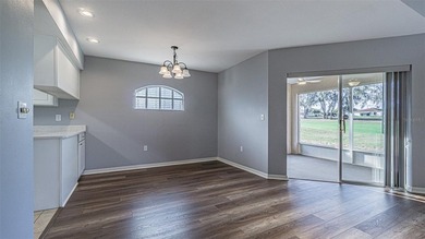 COME to SUNNY FLORIDA! Welcome to resort-style living in the on Tampa Bay Golf and Country Club in Florida - for sale on GolfHomes.com, golf home, golf lot