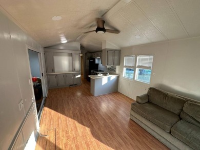 This cute 1 bedroom 1 bath park model with 10x14 bonus room is on Clerbrook Resort, Inc. in Florida - for sale on GolfHomes.com, golf home, golf lot