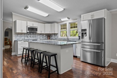 Welcome to a bit of seclusion in the city! You'll find beautiful on Crowne Plaza Tennis and Golf Resort in North Carolina - for sale on GolfHomes.com, golf home, golf lot