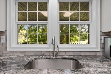 Welcome to a bit of seclusion in the city! You'll find beautiful on Crowne Plaza Tennis and Golf Resort in North Carolina - for sale on GolfHomes.com, golf home, golf lot