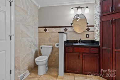 Welcome to a bit of seclusion in the city! You'll find beautiful on Crowne Plaza Tennis and Golf Resort in North Carolina - for sale on GolfHomes.com, golf home, golf lot