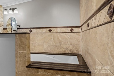 Welcome to a bit of seclusion in the city! You'll find beautiful on Crowne Plaza Tennis and Golf Resort in North Carolina - for sale on GolfHomes.com, golf home, golf lot