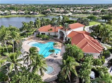 HEATED POOL & SPA WITH CASCADING WATERFALL! Welcome to Belle on Estero Country Club in Florida - for sale on GolfHomes.com, golf home, golf lot