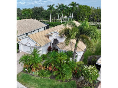 HEATED POOL & SPA WITH CASCADING WATERFALL! Welcome to Belle on Estero Country Club in Florida - for sale on GolfHomes.com, golf home, golf lot