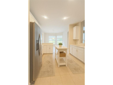 HEATED POOL & SPA WITH CASCADING WATERFALL! Welcome to Belle on Estero Country Club in Florida - for sale on GolfHomes.com, golf home, golf lot