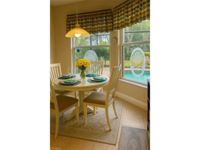 HEATED POOL & SPA WITH CASCADING WATERFALL! Welcome to Belle on Estero Country Club in Florida - for sale on GolfHomes.com, golf home, golf lot