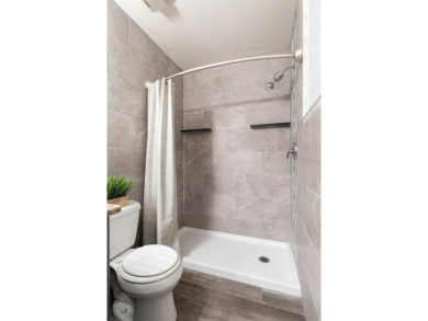 Charming 1-Bedroom End Unit Condo for 55+ buyers with access to on Highland Lakes Executive Golf Course in Florida - for sale on GolfHomes.com, golf home, golf lot