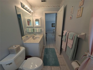 Immaculate *PHILODENDRON* w/private backyard, centrally located on Mainlands Golf Club in Florida - for sale on GolfHomes.com, golf home, golf lot